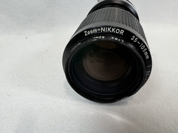 Nikon Zoom-Nikkor 35-105 mm f/3.5-4.5 + Filtro UV L1bc Nikkon - immagine 18