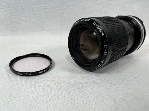 Nikon Zoom-Nikkor 35-105 mm f/3.5-4.5 + Filtro UV L1bc Nikkon - immagine 19