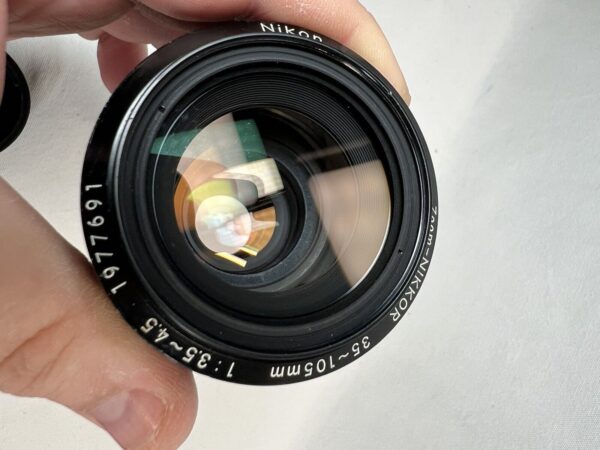 Nikon Zoom-Nikkor 35-105 mm f/3.5-4.5 + Filtro UV L1bc Nikkon - immagine 20
