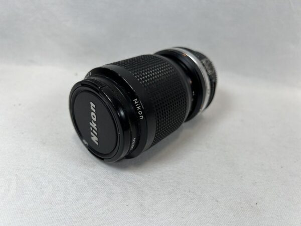 Nikon Zoom-Nikkor 35-105 mm f/3.5-4.5 + Filtro UV L1bc Nikkon - immagine 5