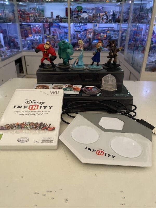 Nintendo wii Disney Infinity + Pedana + personaggi