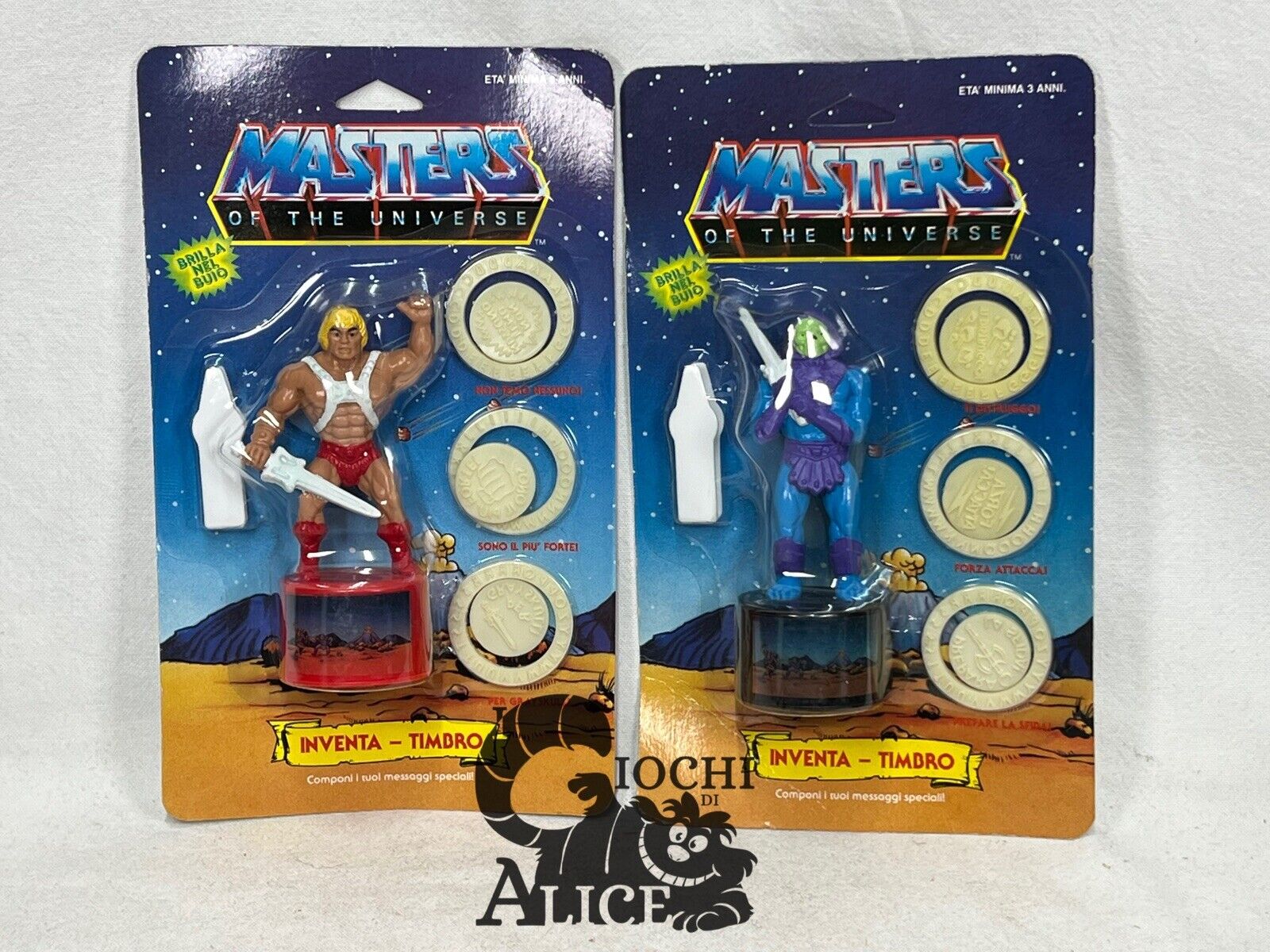 Mattel Masters Of The Universe - Inventa Timbro Coppia He-Man Skeletor